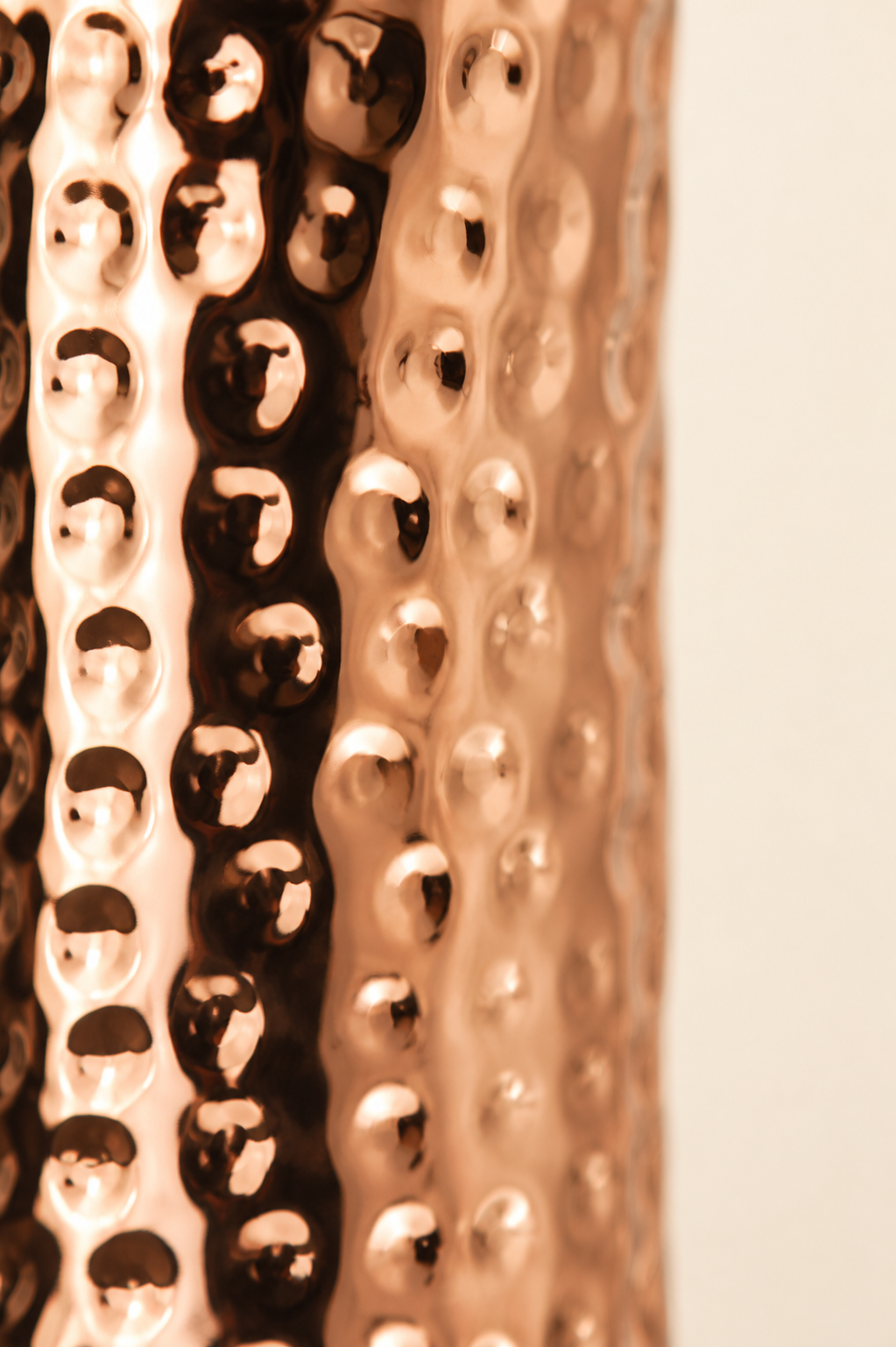 Close-up macro of the hammered copper surface